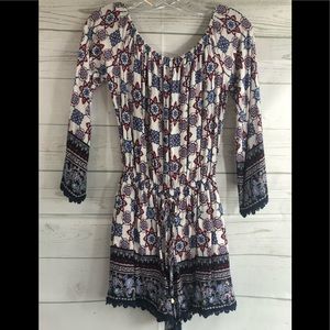 One the Land,  Fun paisley colored romper
